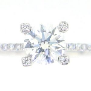 6.5MM Round Brilliant Moissanite & .20TCW Accented Diamond Engagement Ring 14KT WG