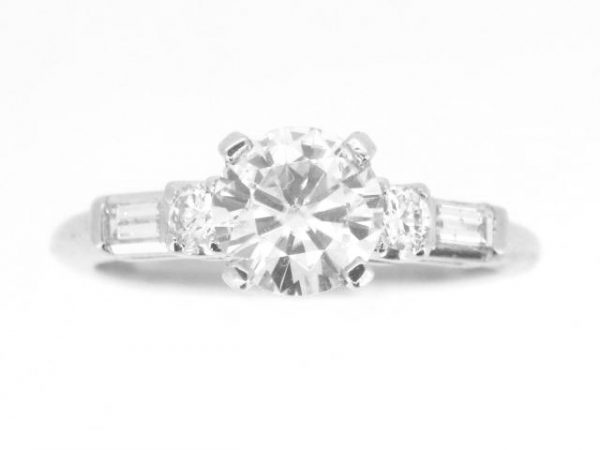 6.5MM Moissanite & .20TCW/4 SI1 GH Baguette & Round Diamonds Ladies Engagement Ring Platinum