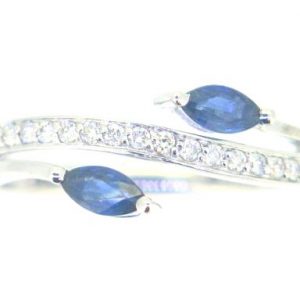 Genuine Sapphire Marquise 5x2.5MM & .14TCW Diamond Bypass Ring 10KT WG