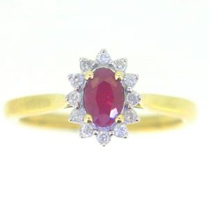 Genuine Ruby Oval 6x4 & .10TCW Diamond Cluster Ladies Ring 10KT