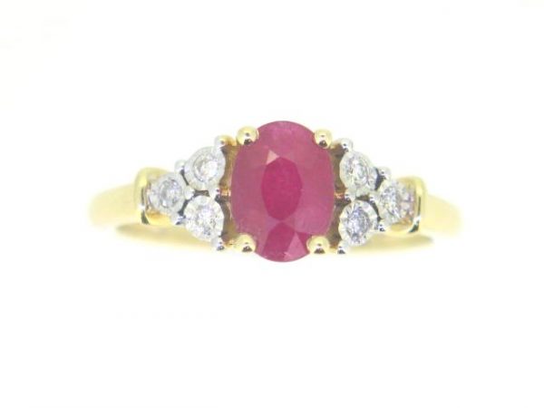 Genuine Ruby Oval 7x5 & .07TCW Diamond Accented Ladies Ring 14KT