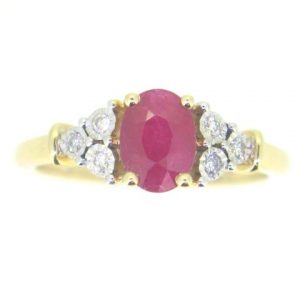 Genuine Ruby Oval 7x5 & .07TCW Diamond Accented Ladies Ring 14KT