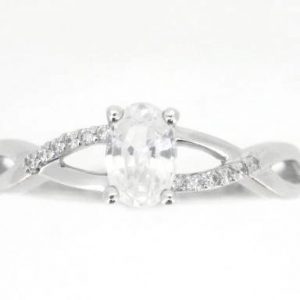 Genuine White.Topaz 6x4 & .05TCW Diamond Accented Infinity Design Ladies Ring 10KT WG