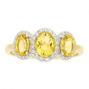 Gen. Citirne Oval 6x4/5x3 & .17TCW Diamond Trio Ladies Ring 10KT