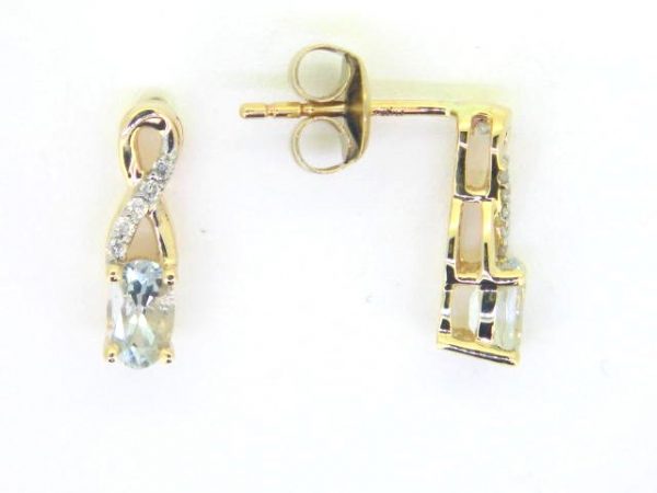 Genuine Aquamarine 5x3 & .05TCW Diamond Accented Infinity Design Stud Earrings 10KT    *FINAL SALE*