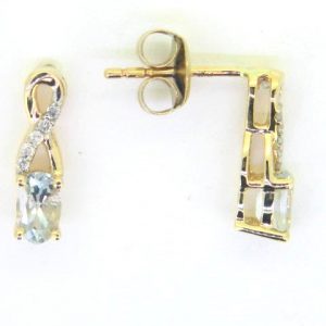 Genuine Aquamarine 5x3 & .05TCW Diamond Accented Infinity Design Stud Earrings 10KT    *FINAL SALE*