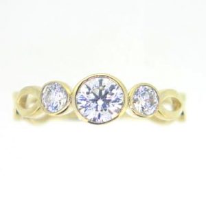 Round Cubic Zirconia Trio Bezel with Infinity Design Shank Ladies Ring 10KT