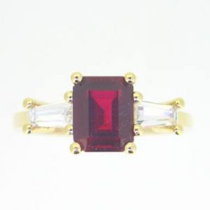 Sim. Ruby 8x6mm with Cubic Zirconia Baguettes Ladies Ring 10KT
