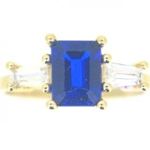 Sim. Blue Sapphire 8x6mm with Cubic Zirconia Baguettes Ladies Ring 10KT