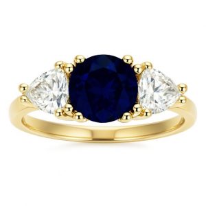 Simulated Blue Sapphire 7MM Round with Cubic Zirconia Trillion Accents Ladies Ring 10KT