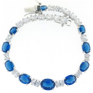 Sim. Sapphire & Cubic Zirconia Oval Graduated 7" Tennis Bracelet Sterling Silver
